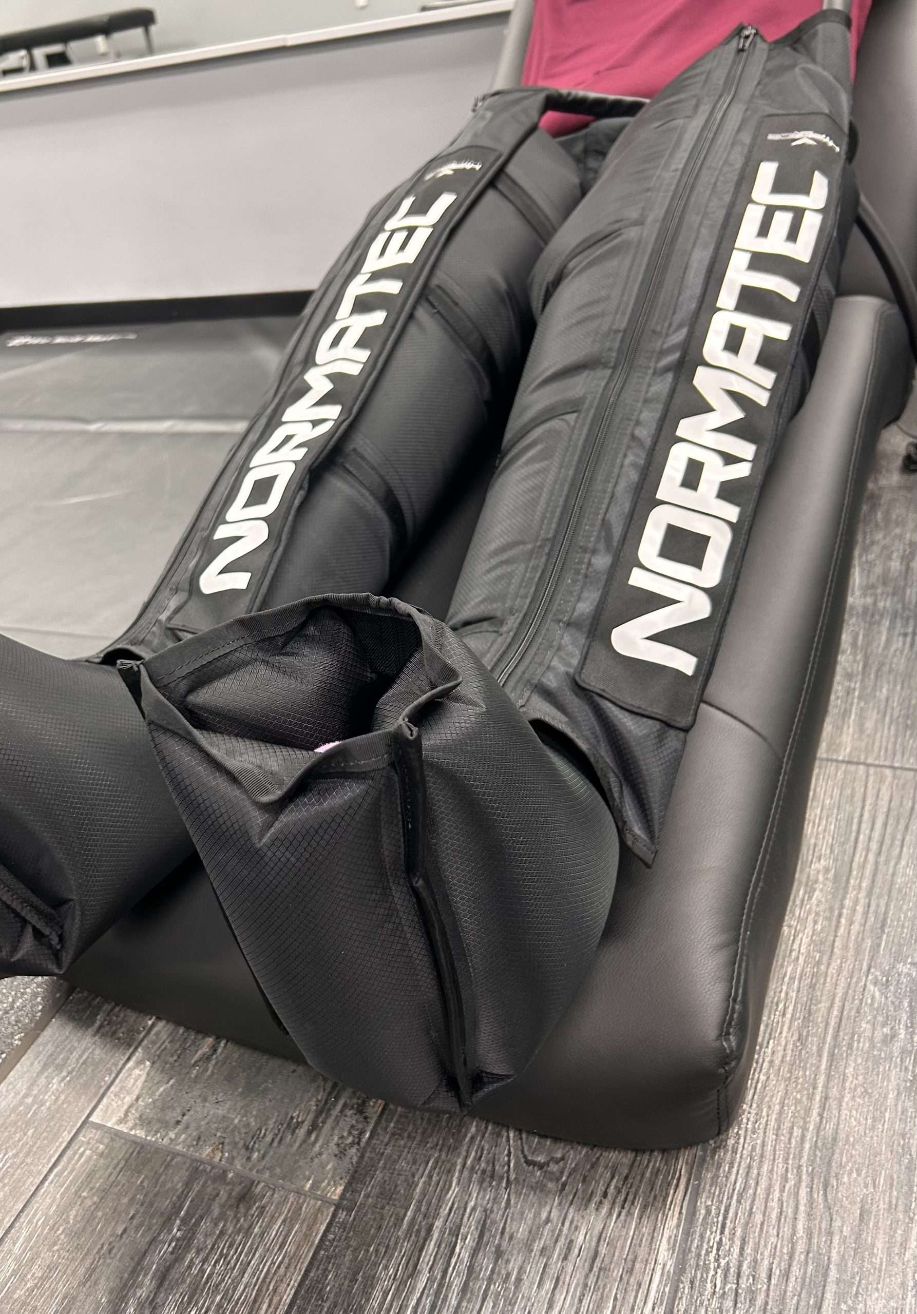 Normatec compression boots set up for a recovery session at Breakaway Chiropractic in Frisco, TX